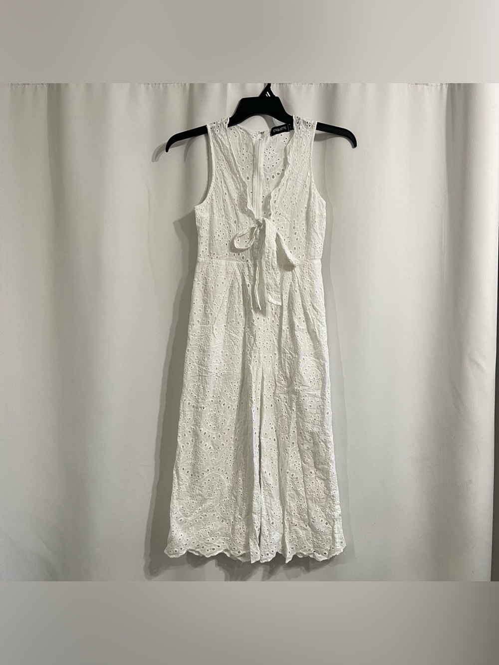 White Etiquette sleeveless eyelet jumpsuit size M ( it runs small) fits size S